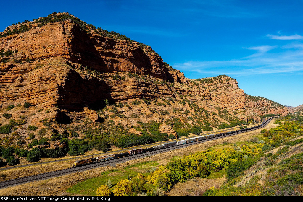 UP 8738 pushing an eastbound manifest freight up Echo Canyon